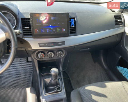 Серый Мицубиси Лансер, объемом двигателя 1.5 л и пробегом 139 тыс. км за 6600 $, фото 16 на Automoto.ua