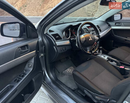 Серый Мицубиси Лансер, объемом двигателя 1.8 л и пробегом 248 тыс. км за 6400 $, фото 6 на Automoto.ua