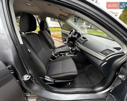 Серый Мицубиси Лансер, объемом двигателя 1.8 л и пробегом 44 тыс. км за 6499 $, фото 24 на Automoto.ua