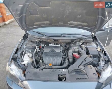 Серый Мицубиси Лансер, объемом двигателя 1.59 л и пробегом 226 тыс. км за 6600 $, фото 4 на Automoto.ua