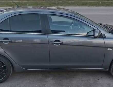 Серый Мицубиси Лансер, объемом двигателя 1.59 л и пробегом 226 тыс. км за 6600 $, фото 5 на Automoto.ua