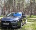 Сірий Міцубісі Lancer, об'ємом двигуна 1.8 л та пробігом 105 тис. км за 9500 $, фото 1 на Automoto.ua