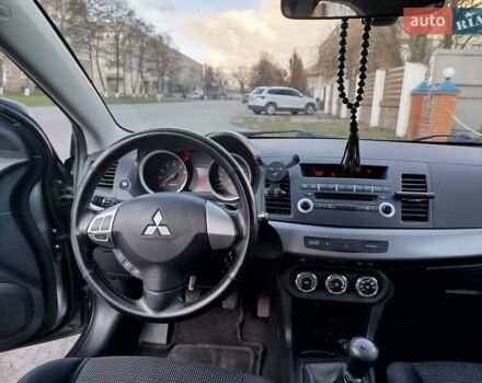 Серый Мицубиси Лансер, объемом двигателя 1.59 л и пробегом 226 тыс. км за 6600 $, фото 2 на Automoto.ua