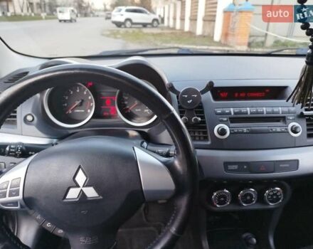 Серый Мицубиси Лансер, объемом двигателя 1.59 л и пробегом 226 тыс. км за 6600 $, фото 11 на Automoto.ua