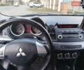 Серый Мицубиси Лансер, объемом двигателя 1.59 л и пробегом 226 тыс. км за 6600 $, фото 11 на Automoto.ua