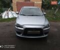 Сірий Міцубісі Lancer, об'ємом двигуна 1.8 л та пробігом 216 тис. км за 7200 $, фото 1 на Automoto.ua