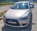 Серый Мицубиси Лансер, объемом двигателя 1.8 л и пробегом 223 тыс. км за 7142 $, фото 1 на Automoto.ua