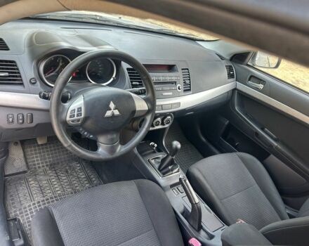 Серый Мицубиси Лансер, объемом двигателя 1.6 л и пробегом 94 тыс. км за 7999 $, фото 7 на Automoto.ua