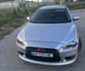 Серый Мицубиси Лансер, объемом двигателя 1.59 л и пробегом 213 тыс. км за 6000 $, фото 1 на Automoto.ua
