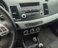 Сірий Міцубісі Lancer, об'ємом двигуна 1.8 л та пробігом 216 тис. км за 7200 $, фото 5 на Automoto.ua
