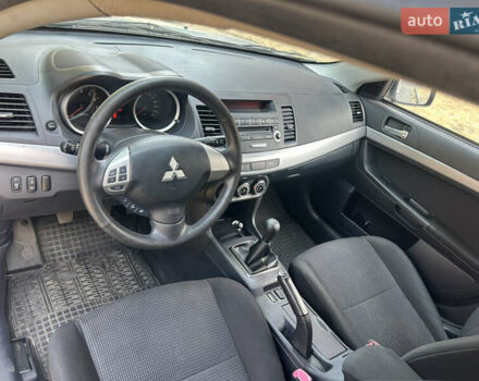Сірий Міцубісі Lancer, об'ємом двигуна 1.59 л та пробігом 94 тис. км за 8200 $, фото 7 на Automoto.ua