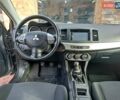 Серый Мицубиси Лансер, объемом двигателя 1.5 л и пробегом 190 тыс. км за 6500 $, фото 25 на Automoto.ua