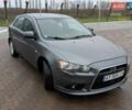 Сірий Міцубісі Lancer, об'ємом двигуна 1.8 л та пробігом 277 тис. км за 6200 $, фото 1 на Automoto.ua