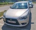 Серый Мицубиси Лансер, объемом двигателя 1.8 л и пробегом 223 тыс. км за 7100 $, фото 1 на Automoto.ua
