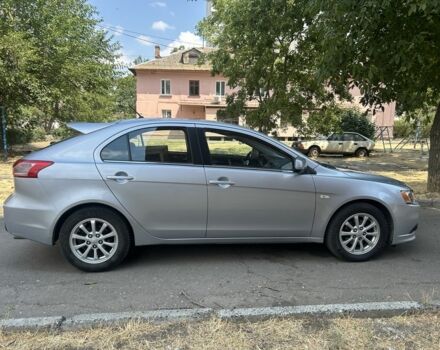 Серый Мицубиси Лансер, объемом двигателя 1.6 л и пробегом 94 тыс. км за 7999 $, фото 3 на Automoto.ua