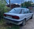 Сірий Міцубісі Lancer, об'ємом двигуна 1.5 л та пробігом 678 тис. км за 474 $, фото 1 на Automoto.ua