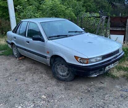 Сірий Міцубісі Lancer, об'ємом двигуна 1.5 л та пробігом 678 тис. км за 474 $, фото 4 на Automoto.ua