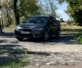 Серый Мицубиси Лансер, объемом двигателя 2 л и пробегом 260 тыс. км за 5492 $, фото 1 на Automoto.ua