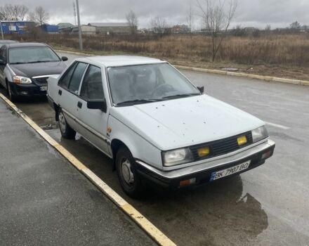 Сірий Міцубісі Lancer, об'ємом двигуна 0.13 л та пробігом 220 тис. км за 500 $, фото 1 на Automoto.ua