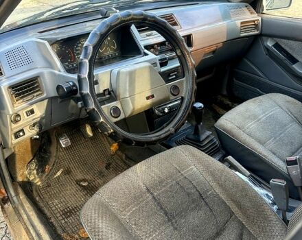 Серый Мицубиси Лансер, объемом двигателя 1.5 л и пробегом 0 тыс. км за 499 $, фото 4 на Automoto.ua