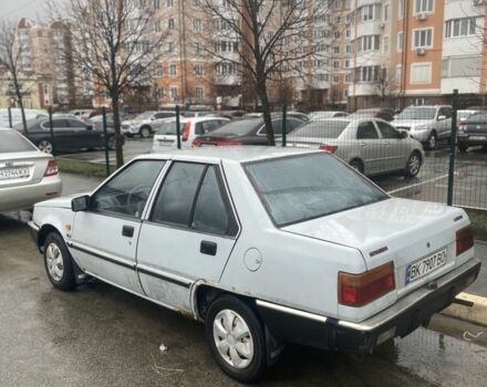 Сірий Міцубісі Lancer, об'ємом двигуна 0.13 л та пробігом 220 тис. км за 500 $, фото 3 на Automoto.ua