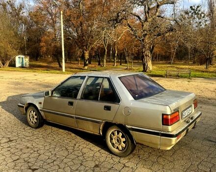 Серый Мицубиси Лансер, объемом двигателя 1.5 л и пробегом 0 тыс. км за 499 $, фото 2 на Automoto.ua