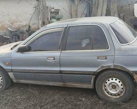 Сірий Міцубісі Lancer, об'ємом двигуна 1.5 л та пробігом 125 тис. км за 720 $, фото 1 на Automoto.ua