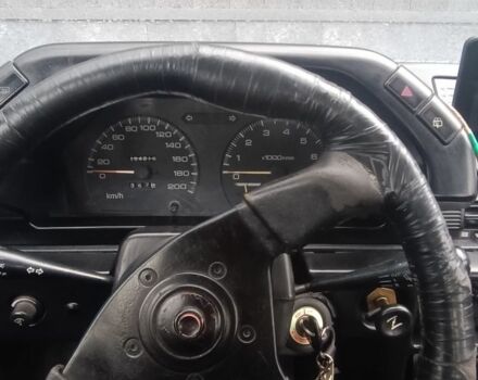 Серый Мицубиси Лансер, объемом двигателя 1.5 л и пробегом 450 тыс. км за 550 $, фото 5 на Automoto.ua