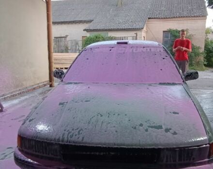 Серый Мицубиси Лансер, объемом двигателя 1.5 л и пробегом 450 тыс. км за 550 $, фото 1 на Automoto.ua