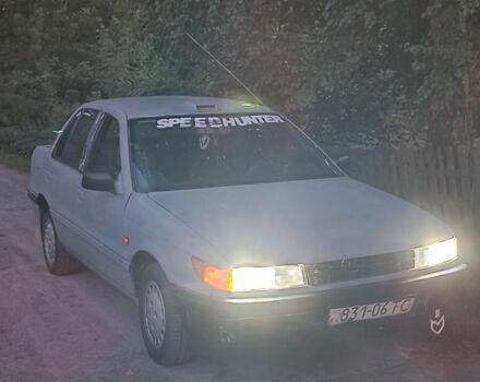 Серый Мицубиси Лансер, объемом двигателя 1.5 л и пробегом 450 тыс. км за 550 $, фото 2 на Automoto.ua