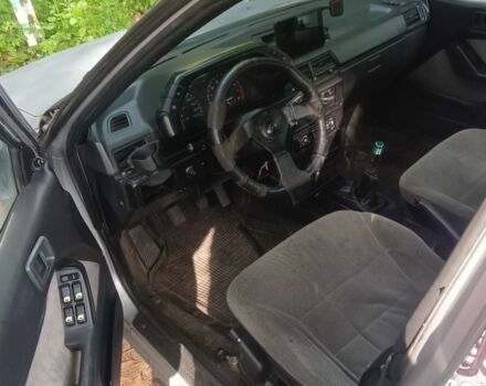 Серый Мицубиси Лансер, объемом двигателя 1.5 л и пробегом 450 тыс. км за 550 $, фото 6 на Automoto.ua