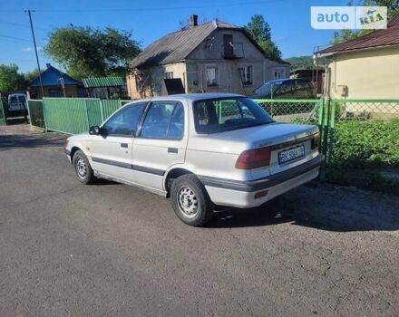 Сірий Міцубісі Lancer, об'ємом двигуна 1.5 л та пробігом 230 тис. км за 1500 $, фото 1 на Automoto.ua