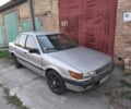 Сірий Міцубісі Lancer, об'ємом двигуна 1.3 л та пробігом 436 тис. км за 337 $, фото 1 на Automoto.ua