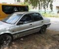 Сірий Міцубісі Lancer, об'ємом двигуна 1.3 л та пробігом 400 тис. км за 484 $, фото 1 на Automoto.ua