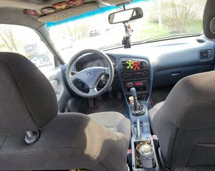 Серый Мицубиси Лансер, объемом двигателя 1.6 л и пробегом 334 тыс. км за 2200 $, фото 2 на Automoto.ua