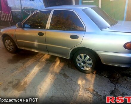 Сірий Міцубісі Lancer, об'ємом двигуна 1.3 л та пробігом 0 тис. км за 1200 $, фото 3 на Automoto.ua