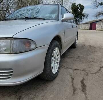 Серый Мицубиси Лансер, объемом двигателя 1.6 л и пробегом 334 тыс. км за 2200 $, фото 10 на Automoto.ua