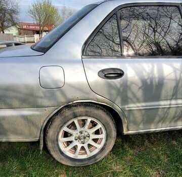 Серый Мицубиси Лансер, объемом двигателя 1.6 л и пробегом 334 тыс. км за 2200 $, фото 4 на Automoto.ua