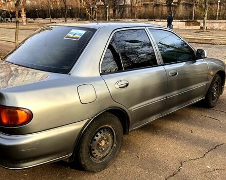 Сірий Міцубісі Lancer, об'ємом двигуна 1.3 л та пробігом 415 тис. км за 1850 $, фото 3 на Automoto.ua