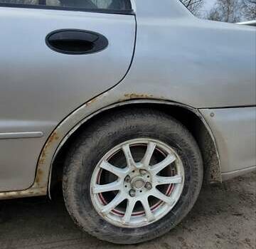 Серый Мицубиси Лансер, объемом двигателя 1.6 л и пробегом 334 тыс. км за 2200 $, фото 8 на Automoto.ua