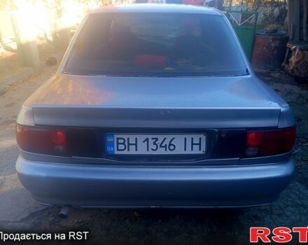 Сірий Міцубісі Lancer, об'ємом двигуна 1.3 л та пробігом 0 тис. км за 1200 $, фото 1 на Automoto.ua