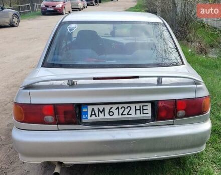 Серый Мицубиси Лансер, объемом двигателя 1.6 л и пробегом 334 тыс. км за 2200 $, фото 6 на Automoto.ua