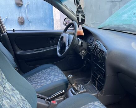 Сірий Міцубісі Lancer, об'ємом двигуна 1.3 л та пробігом 3 тис. км за 700 $, фото 4 на Automoto.ua