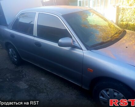Сірий Міцубісі Lancer, об'ємом двигуна 1.3 л та пробігом 0 тис. км за 1200 $, фото 2 на Automoto.ua