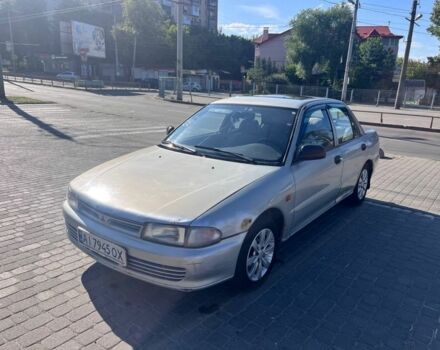 Сірий Міцубісі Lancer, об'ємом двигуна 1.3 л та пробігом 331 тис. км за 800 $, фото 3 на Automoto.ua