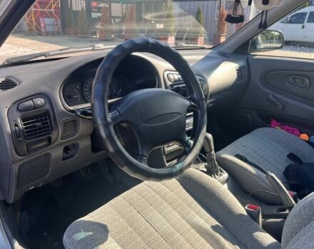 Сірий Міцубісі Lancer, об'ємом двигуна 1.3 л та пробігом 331 тис. км за 800 $, фото 7 на Automoto.ua