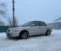 Серый Мицубиси Лансер, объемом двигателя 1.6 л и пробегом 300 тыс. км за 2100 $, фото 1 на Automoto.ua
