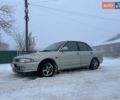 Серый Мицубиси Лансер, объемом двигателя 1.6 л и пробегом 300 тыс. км за 2100 $, фото 1 на Automoto.ua