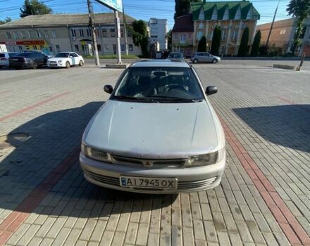 Сірий Міцубісі Lancer, об'ємом двигуна 1.3 л та пробігом 331 тис. км за 800 $, фото 1 на Automoto.ua