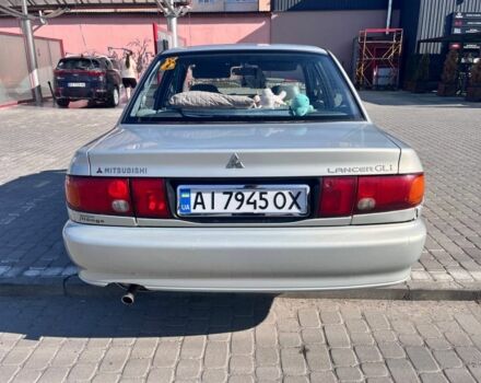 Сірий Міцубісі Lancer, об'ємом двигуна 1.3 л та пробігом 331 тис. км за 800 $, фото 11 на Automoto.ua